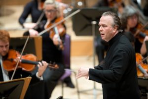 Sir Mark Elder conducting the Hallé Orchestra